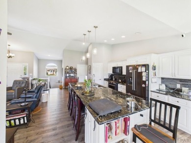 Welcome to this stunning ranch-style home overlooking the golf on Desert Hawk At Pueblo West in Colorado - for sale on GolfHomes.com, golf home, golf lot