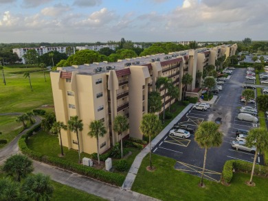 This beautifully renovated ground-floor corner unit offers on Poinciana Golf Club in Florida - for sale on GolfHomes.com, golf home, golf lot