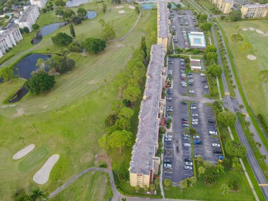 This beautifully renovated ground-floor corner unit offers on Poinciana Golf Club in Florida - for sale on GolfHomes.com, golf home, golf lot