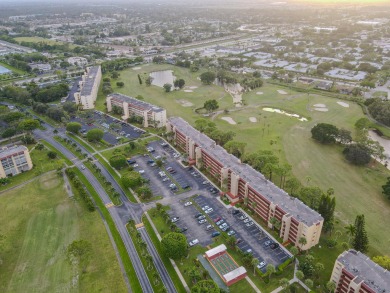 This beautifully renovated ground-floor corner unit offers on Poinciana Golf Club in Florida - for sale on GolfHomes.com, golf home, golf lot