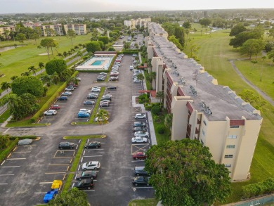 This beautifully renovated ground-floor corner unit offers on Poinciana Golf Club in Florida - for sale on GolfHomes.com, golf home, golf lot