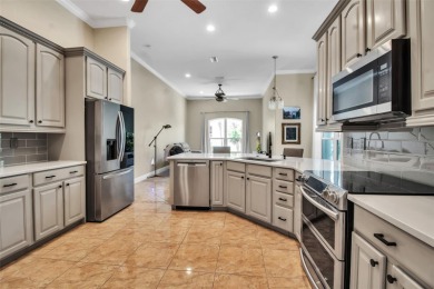 Welcome to this meticulously maintained, custom-built, and on Jacaranda West Country Club in Florida - for sale on GolfHomes.com, golf home, golf lot