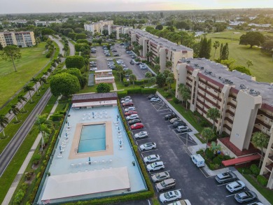 This beautifully renovated ground-floor corner unit offers on Poinciana Golf Club in Florida - for sale on GolfHomes.com, golf home, golf lot