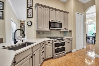Welcome to this meticulously maintained, custom-built, and on Jacaranda West Country Club in Florida - for sale on GolfHomes.com, golf home, golf lot