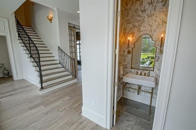 Experience refined living in the gated community of English Turn on English Turn Golf and Country Club in Louisiana - for sale on GolfHomes.com, golf home, golf lot