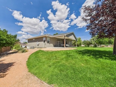 Welcome to this stunning ranch-style home overlooking the golf on Desert Hawk At Pueblo West in Colorado - for sale on GolfHomes.com, golf home, golf lot