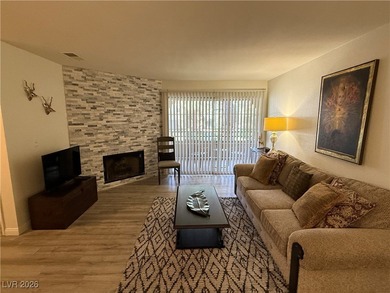 REMODELED, GUARD GATED, SECOND FLOOR CONDO WITH GORGEOUS STACKED on Canyon Gate Country Club in Nevada - for sale on GolfHomes.com, golf home, golf lot