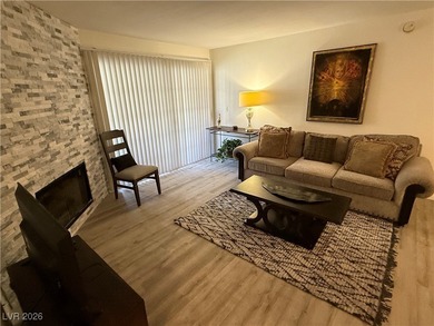 REMODELED, GUARD GATED, SECOND FLOOR CONDO WITH GORGEOUS STACKED on Canyon Gate Country Club in Nevada - for sale on GolfHomes.com, golf home, golf lot