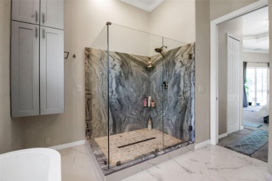 Welcome to this meticulously maintained, custom-built, and on Jacaranda West Country Club in Florida - for sale on GolfHomes.com, golf home, golf lot