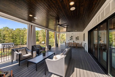 Welcome to homestead living at its finest that offers 5 bedrooms on Hasentree Club in North Carolina - for sale on GolfHomes.com, golf home, golf lot