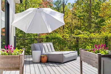 Welcome to homestead living at its finest that offers 5 bedrooms on Hasentree Club in North Carolina - for sale on GolfHomes.com, golf home, golf lot