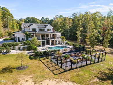 Welcome to homestead living at its finest that offers 5 bedrooms on Hasentree Club in North Carolina - for sale on GolfHomes.com, golf home, golf lot