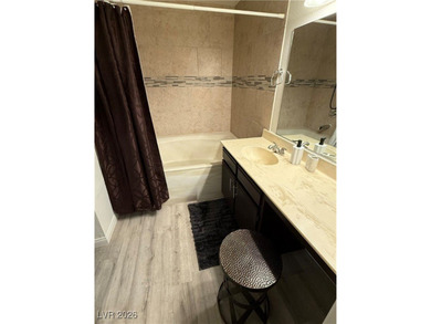 REMODELED, GUARD GATED, SECOND FLOOR CONDO WITH GORGEOUS STACKED on Canyon Gate Country Club in Nevada - for sale on GolfHomes.com, golf home, golf lot