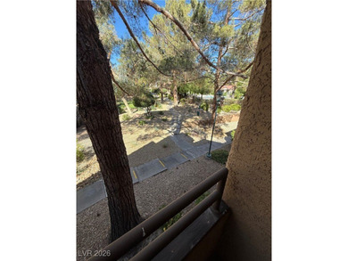 REMODELED, GUARD GATED, SECOND FLOOR CONDO WITH GORGEOUS STACKED on Canyon Gate Country Club in Nevada - for sale on GolfHomes.com, golf home, golf lot