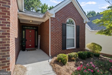 Welcome to this charming, recently upgraded 3-bedroom on Eagles Landing Country Club in Georgia - for sale on GolfHomes.com, golf home, golf lot