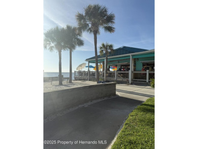 Welcome to your coastal escape in Hudson Beach Estates! This on Heritage Pines Country Club in Florida - for sale on GolfHomes.com, golf home, golf lot
