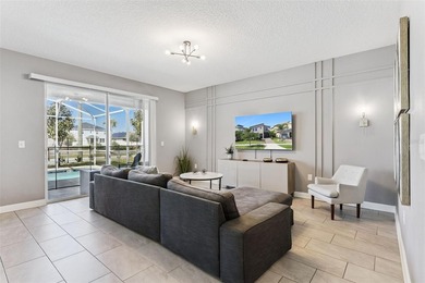 Step into the ultimate Florida lifestyle with this stunning on The Oasis Club at Champions Gate in Florida - for sale on GolfHomes.com, golf home, golf lot