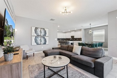 Step into the ultimate Florida lifestyle with this stunning on The Oasis Club at Champions Gate in Florida - for sale on GolfHomes.com, golf home, golf lot