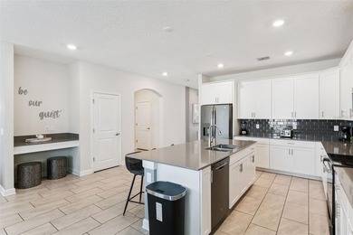 Step into the ultimate Florida lifestyle with this stunning on The Oasis Club at Champions Gate in Florida - for sale on GolfHomes.com, golf home, golf lot