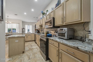 Welcome to 45 St Andrews Ct where elegance meets comfort in one on Grand Haven Golf Club in Florida - for sale on GolfHomes.com, golf home, golf lot