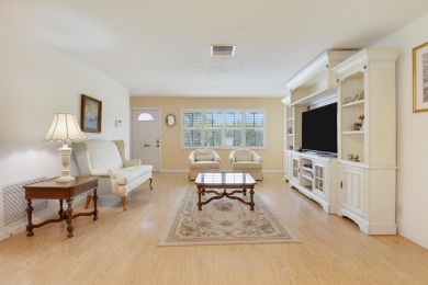 This charming 2-bedroom, 2-bathroom home in Palm Beach on Leisureville Community Golf Course in Florida - for sale on GolfHomes.com, golf home, golf lot