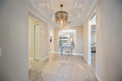 Executive 4-bedroom, 2-bath pool home with a 2-car garage and on Sarasota National Golf Club in Florida - for sale on GolfHomes.com, golf home, golf lot