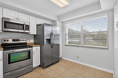 Beautiful Water View First Floor 2/2 Condo in Wynmoor Golf on Wynmoor Golf Course in Florida - for sale on GolfHomes.com, golf home, golf lot