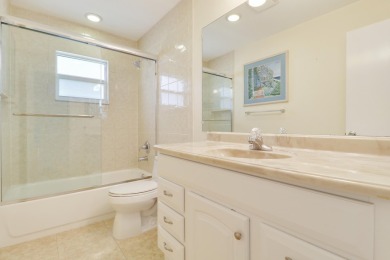 This charming 2-bedroom, 2-bathroom home in Palm Beach on Leisureville Community Golf Course in Florida - for sale on GolfHomes.com, golf home, golf lot