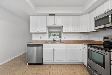 Beautiful Water View First Floor 2/2 Condo in Wynmoor Golf on Wynmoor Golf Course in Florida - for sale on GolfHomes.com, golf home, golf lot