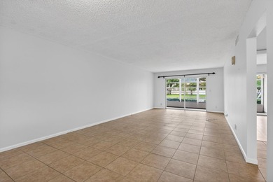 Beautiful Water View 1st Floor, Parking Spot is in front of the on Wynmoor Golf Course in Florida - for sale on GolfHomes.com, golf home, golf lot