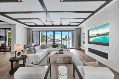 Experience unparalleled luxury in this exceptional bay front on The Moorings Country Club in Florida - for sale on GolfHomes.com, golf home, golf lot