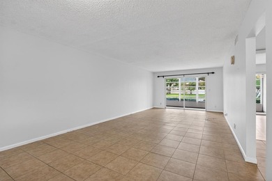 Beautiful Water View First Floor 2/2 Condo in Wynmoor Golf on Wynmoor Golf Course in Florida - for sale on GolfHomes.com, golf home, golf lot