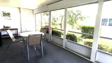 This charming 2-bedroom, 2-bathroom home in Palm Beach on Leisureville Community Golf Course in Florida - for sale on GolfHomes.com, golf home, golf lot