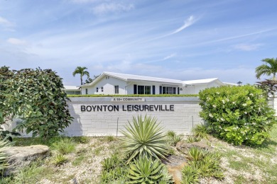 This charming 2-bedroom, 2-bathroom home in Palm Beach on Leisureville Community Golf Course in Florida - for sale on GolfHomes.com, golf home, golf lot