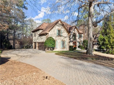 WELCOME HOME! Embrace Luxury Living in the coveted community of on St. Ives Golf and Country Club in Georgia - for sale on GolfHomes.com, golf home, golf lot