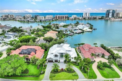 Experience unparalleled luxury in this exceptional bay front on The Moorings Country Club in Florida - for sale on GolfHomes.com, golf home, golf lot