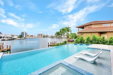 Experience unparalleled luxury in this exceptional bay front on The Moorings Country Club in Florida - for sale on GolfHomes.com, golf home, golf lot