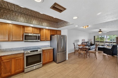 ALL OF THE RIGHT INGREDIENTS PLUS YOUR OWN DEEDED BOAT SLIP WITH on Oyster Creek Golf Club in Florida - for sale on GolfHomes.com, golf home, golf lot