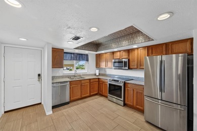 ALL OF THE RIGHT INGREDIENTS PLUS YOUR OWN DEEDED BOAT SLIP WITH on Oyster Creek Golf Club in Florida - for sale on GolfHomes.com, golf home, golf lot