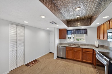 ALL OF THE RIGHT INGREDIENTS PLUS YOUR OWN DEEDED BOAT SLIP WITH on Oyster Creek Golf Club in Florida - for sale on GolfHomes.com, golf home, golf lot