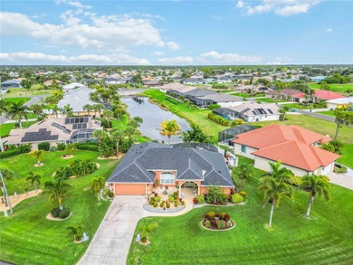 Stunning and elegantly updated home offering tranquil water on Rotonda Golf and Country Club - Long Marsh  in Florida - for sale on GolfHomes.com, golf home, golf lot