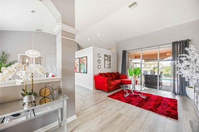 Stunning and elegantly updated home offering tranquil water on Rotonda Golf and Country Club - Long Marsh  in Florida - for sale on GolfHomes.com, golf home, golf lot