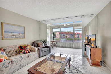 Discover convenience and comfort in this condo unit located in on Sunrise Lakes Phase III in Florida - for sale on GolfHomes.com, golf home, golf lot