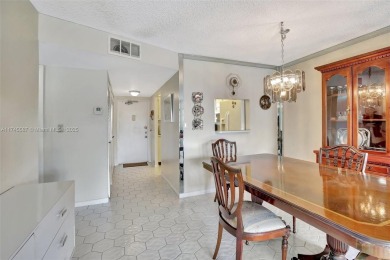 Discover convenience and comfort in this condo unit located in on Sunrise Lakes Phase III in Florida - for sale on GolfHomes.com, golf home, golf lot