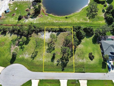 This perfect WATERFRONT LOT is located on a cul de sac and on on Pinemoor West Golf Club in Florida - for sale on GolfHomes.com, golf home, golf lot