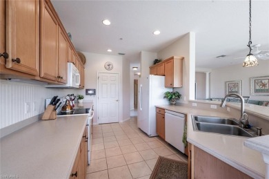 Move-In Ready Carriage Home with Stunning Lake  Golf Views in on Naples Lakes Country Club in Florida - for sale on GolfHomes.com, golf home, golf lot