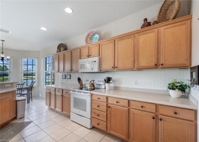 Move-In Ready Carriage Home with Stunning Lake  Golf Views in on Naples Lakes Country Club in Florida - for sale on GolfHomes.com, golf home, golf lot
