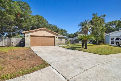 Welcome to this charming 3-bedroom, 2-bathroom home situated on on Countryside Country Club in Florida - for sale on GolfHomes.com, golf home, golf lot