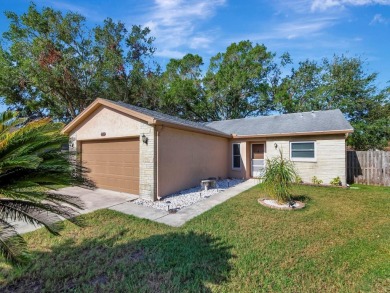 Welcome to this charming 3-bedroom, 2-bathroom home situated on on Countryside Country Club in Florida - for sale on GolfHomes.com, golf home, golf lot