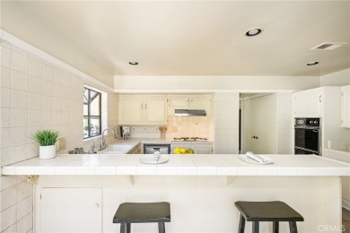 Welcome to this spacious 4-bedroom, 3-bathroom pool and spa home on Los Coyotes Country Club in California - for sale on GolfHomes.com, golf home, golf lot